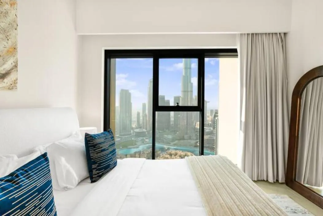Exclusive 4 Bedroom Apartment I Burj Khalifa And Fountain Views I Free Wi-Fi, Pool, Gym & Parking I By Meerak Dubai United Arab Emirates