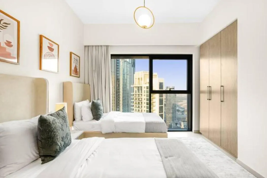 Exclusive 4 Bedroom Apartment I Burj Khalifa And Fountain Views I Free Wi-Fi, Pool, Gym & Parking I By Meerak Dubai